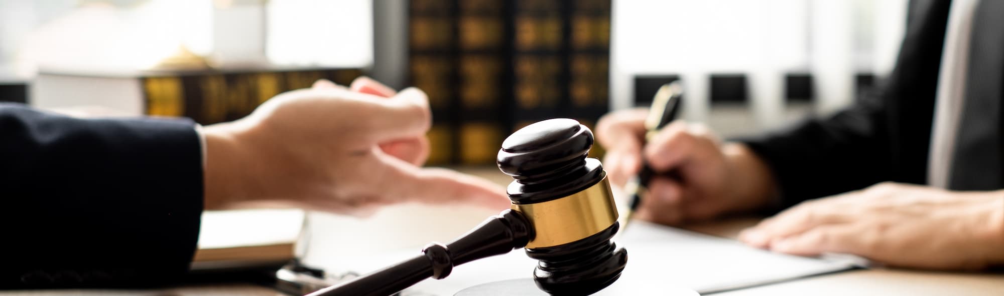 The lawyer and client discuss the lawsuit, analyze facts, explore legal options, and plan their strategy together.